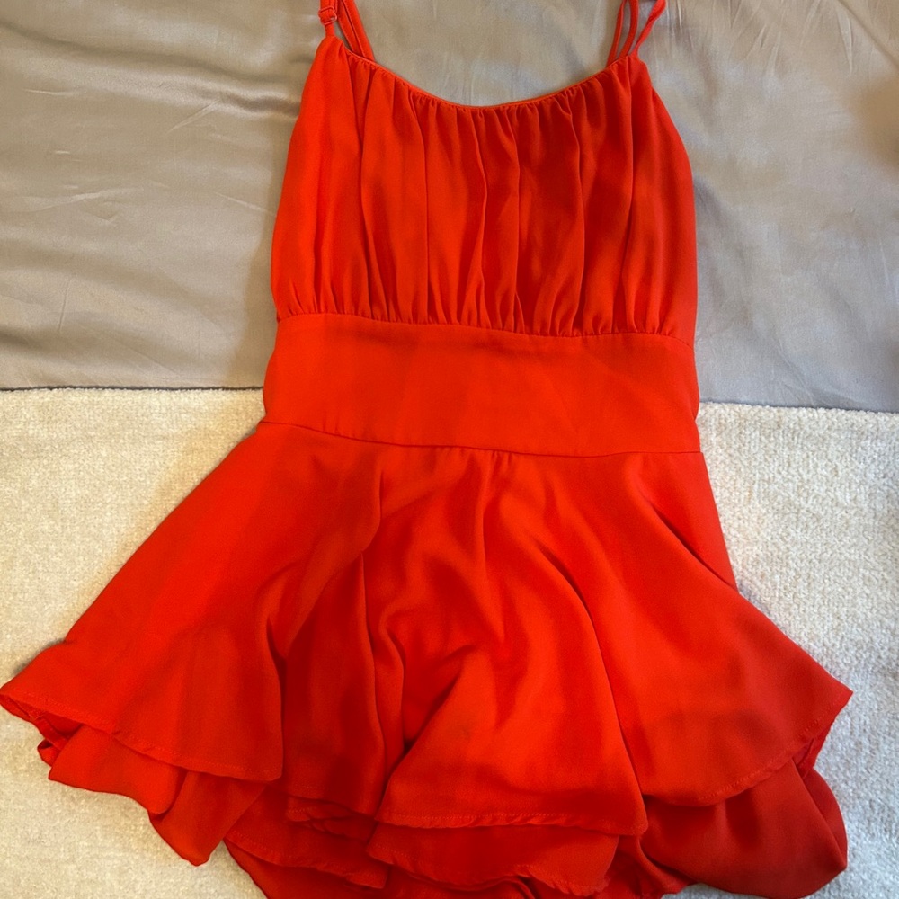 Red romper from Lavish Boutique